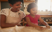 Mother and daughter baking